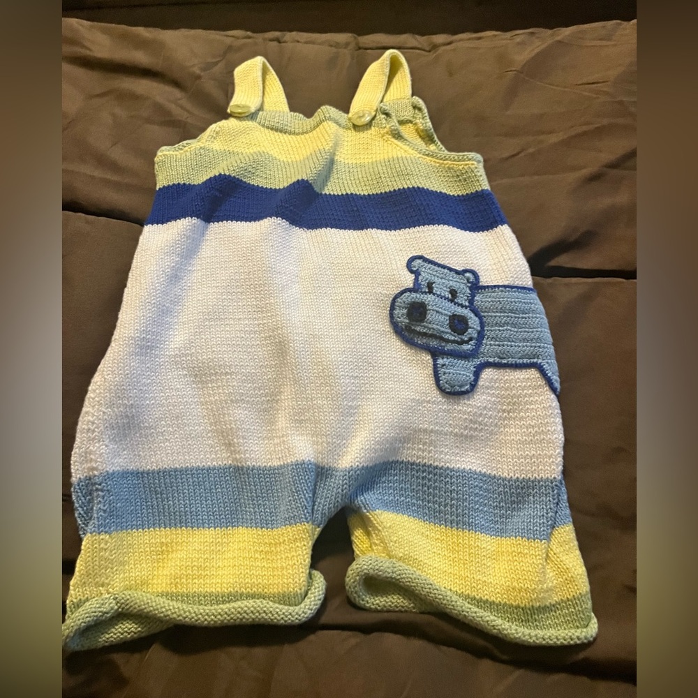 Knit romper with hippo